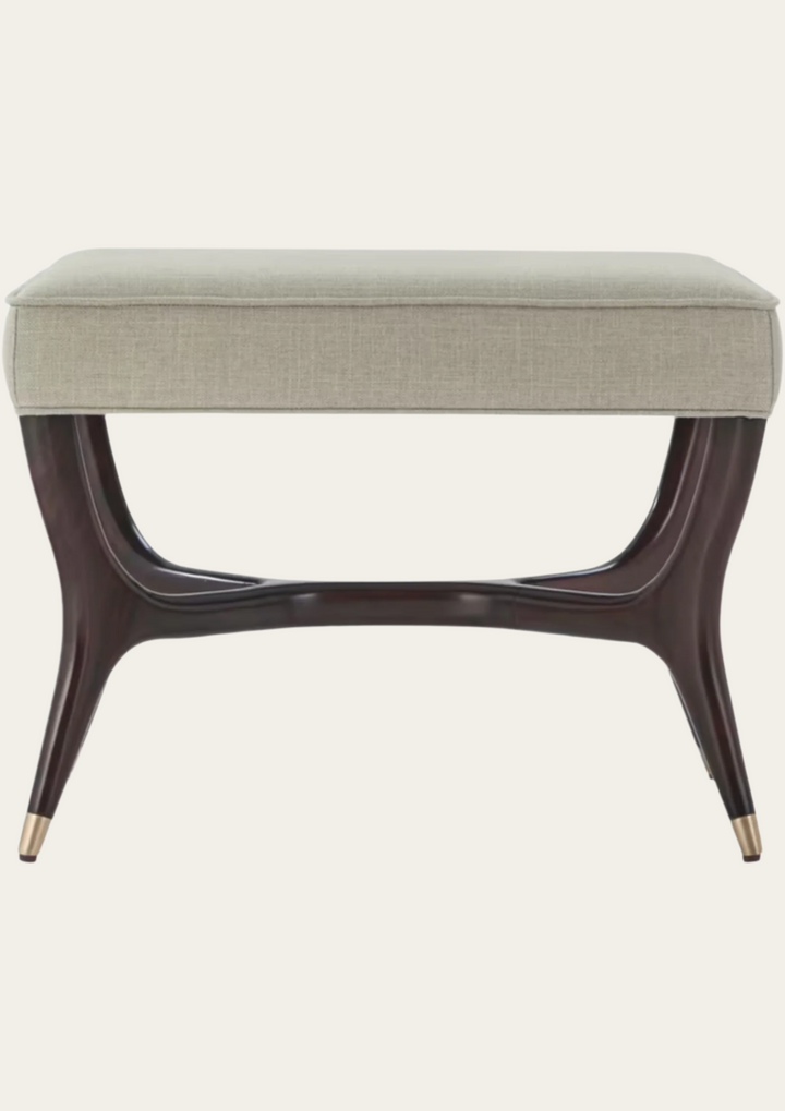 Beige ottoman with dark wooden legs on a white background
