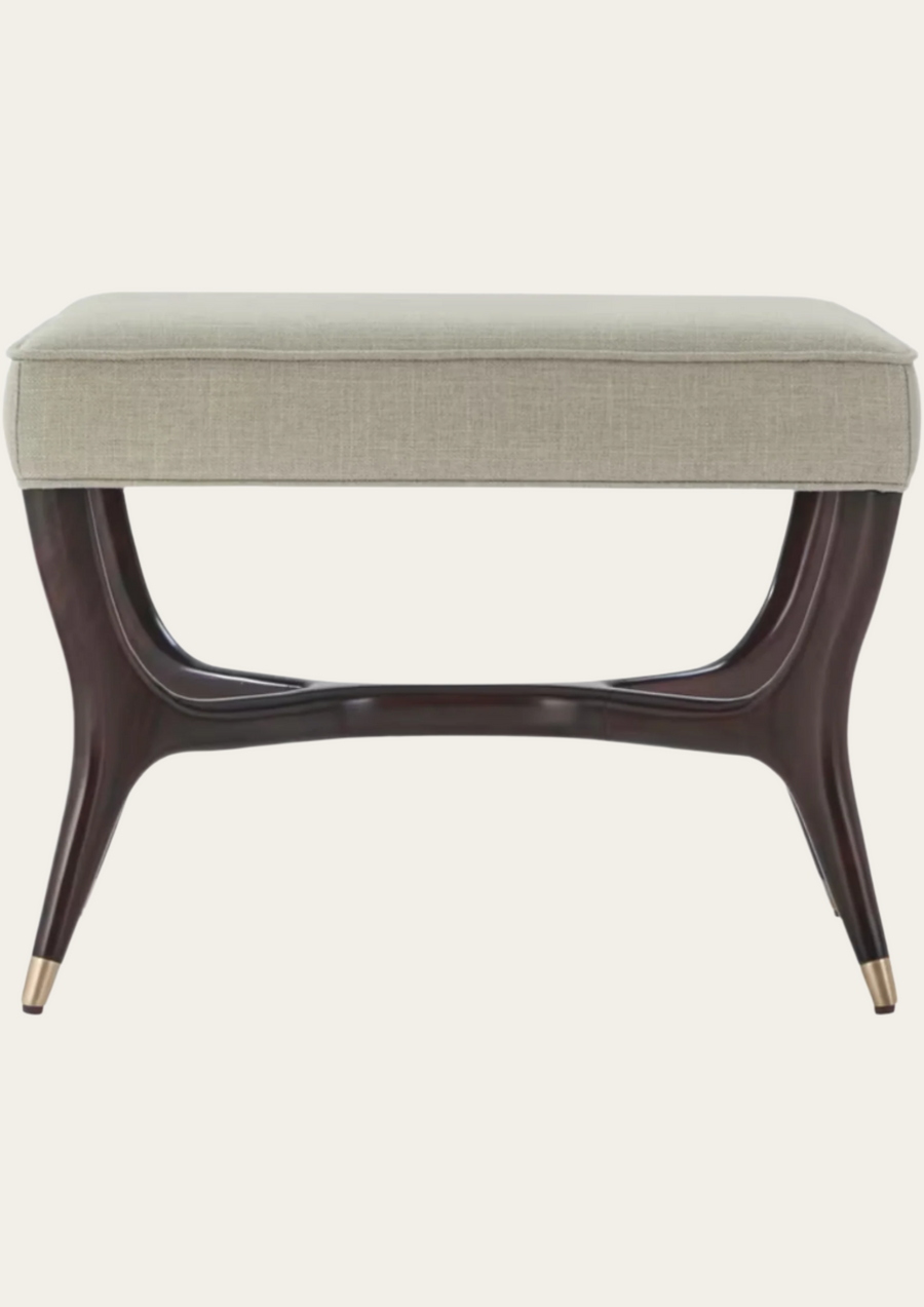 Beige ottoman with dark wooden legs on a white background
